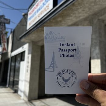 Instant Passport Photo branded passport photo sample outside the storefront